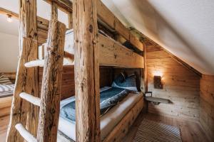 Letto o letti in una camera di Webertonihütte