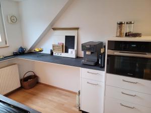 Kuchyň nebo kuchyňský kout v ubytování Ferienwohnung Dornbirn City