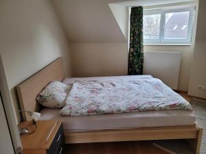 Postel nebo postele na pokoji v ubytování Ferienwohnung Dornbirn City