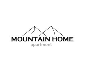 a logo for mountain home apartments at MOUNTAIN HOME apartment in Finkenberg