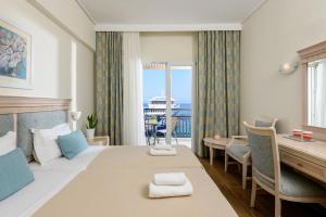 Hotel Timoleon客房内的一张或多张床位