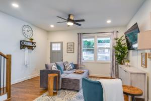 a living room with a couch and a ceiling fan at Durham Vacation Rental 1 Mi to Duke University! in Durham