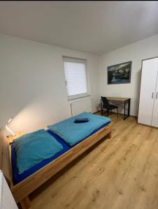 Ein Bett oder Betten in einem Zimmer der Unterkunft S&D