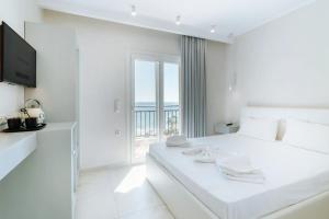 A bed or beds in a room at Golfo Beach
