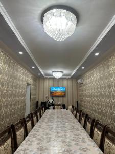 a large conference room with a long table and chairs at Karakalpak Travel in Nukus +77 photos