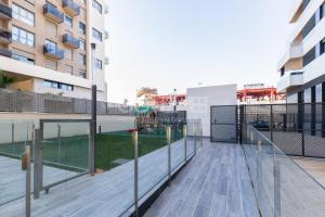 a balcony with a view of a swimming pool at SUPERB DÚPLEX with Pool & Garage in Valencia