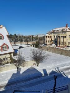 a view from the roof of a building in the snow at Villa jouhara in Ifrane