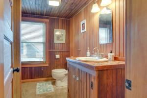 a bathroom with a sink and a toilet at Historic Cottage w/ Beautiful Oceanfront View in Marshfield +27 photos