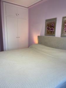 Łóżko lub łóżka w pokoju w obiekcie Appartement BlancoSol in La Mata