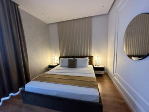 Voodi või voodid majutusasutuse HOTEL UJVARA toas