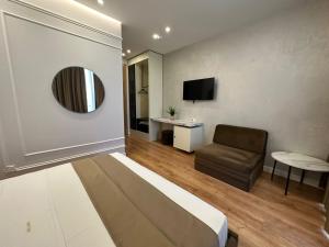 TV a/nebo společenská místnost v ubytování HOTEL UJVARA