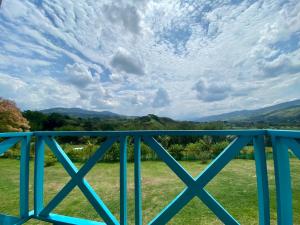 a view of the mountains from a bridge at Hotel la hacienda del pienta in Charalá