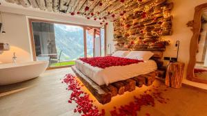 Giường trong phòng chung tại Hotel Chalet Al Foss
