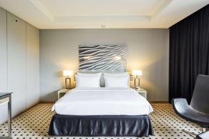 Voodi või voodid majutusasutuse Radisson Blu Conference Hotel, Düsseldorf toas