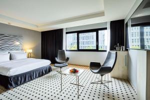 Voodi või voodid majutusasutuse Radisson Blu Conference Hotel, Düsseldorf toas