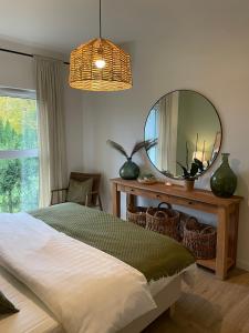 Ένα ή περισσότερα κρεβάτια σε δωμάτιο στο Apartament FOREST - HOME APART