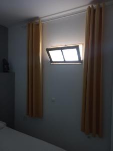 Postel nebo postele na pokoji v ubytování Kaza Jindung