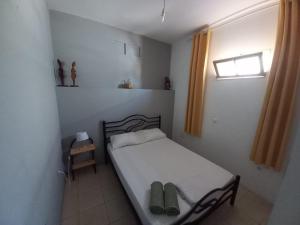 Postel nebo postele na pokoji v ubytování Kaza Jindung