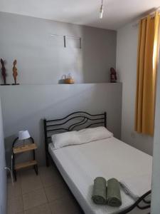 Postel nebo postele na pokoji v ubytování Kaza Jindung