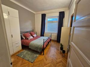 Postel nebo postele na pokoji v ubytování Apartma Pekrska vila