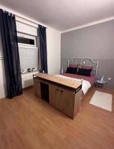 Postel nebo postele na pokoji v ubytování Apartma Pekrska vila