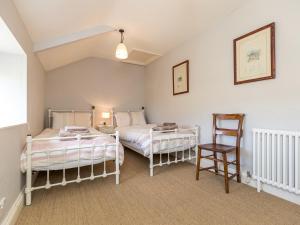 Postel nebo postele na pokoji v ubytování Wdig Farmhouse - Qc1263