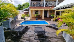 Bazén v ubytování VILLA NAUTILIA, vue mer, proche plage nebo v jeho okolí