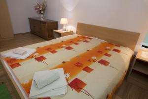 Postel nebo postele na pokoji v ubytování "Azzurra Apartments