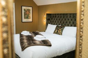 Katil atau katil-katil dalam bilik di Foxlow Grange By Muse Escapes