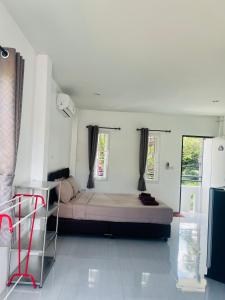 Ένα ή περισσότερα κρεβάτια σε δωμάτιο στο Rest Mind House