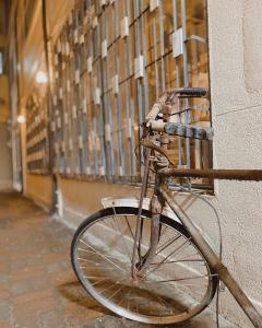 a bike parked against a wall next to a building at 未艾公寓WeLove Apartment in Hsin-ying