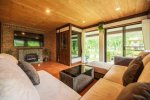 Posezení v ubytování Khao Yai Log House
