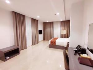 Krevet ili kreveti u jedinici u okviru objekta Wave View Hotel