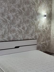 Posteľ alebo postele v izbe v ubytovaní Atlant luxury Big Family Perlina Apart on Golovna поряд з ТЦ Депот