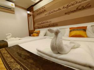 Postel nebo postele na pokoji v ubytování Wonderful Chiang Mai Home