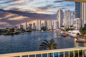 a view of a river in a city with tall buildings at Amazing Water Views Surfers Paradise in Gold Coast