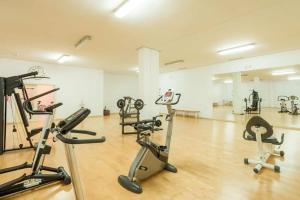 a gym with several exercise bikes in a room at LUX Apt Puerto Banus-Pool-Terrace 5 min to beach in Marbella