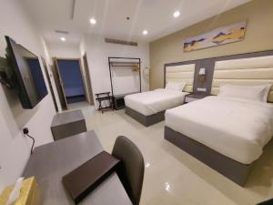 Krevet ili kreveti u jedinici u okviru objekta Wave View Hotel
