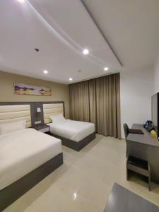 Krevet ili kreveti u jedinici u okviru objekta Wave View Hotel