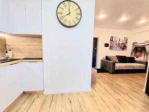 En eller flere senge i et værelse på Квартира в новострое на Ботанике