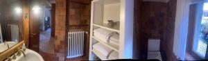 a bathroom with a stair case with towels at Ferienhaus Kobolzeller Schlößchen a.d.Weinsteige in Rothenburg ob der Tauber +6 photos