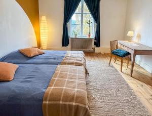 Postel nebo postele na pokoji v ubytování Fridhem Coursecenter & Guesthouse