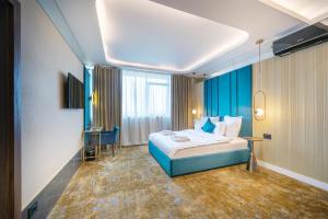 Postel nebo postele na pokoji v ubytování Yasu Luxury Rooms