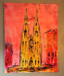 a painting of a cathedral on a red background at Deluxe Altbaucharme in zentraler Lage in Kiel