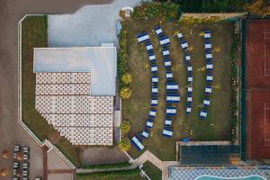 an overhead view of a parking lot with cars at Kremlin Palace in Lara