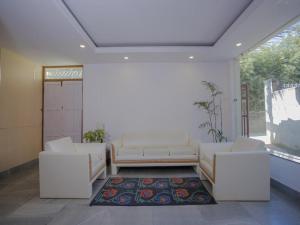 Ein Sitzbereich in der Unterkunft Hotel Bodhiz TUSAL