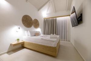 Voodi või voodid majutusasutuse CP Seafront Suites toas