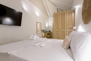 Voodi või voodid majutusasutuse CP Seafront Suites toas