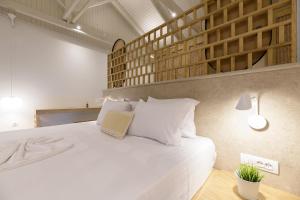 Voodi või voodid majutusasutuse CP Seafront Suites toas