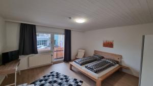 Postel nebo postele na pokoji v ubytování Apartment- Zimmer Pernter